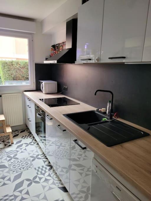 Appartement Avec Jardinet เลอ เปอติท-เกอวียี ภายนอก รูปภาพ